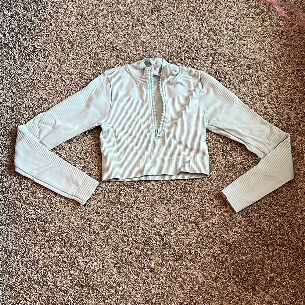light blue half zip